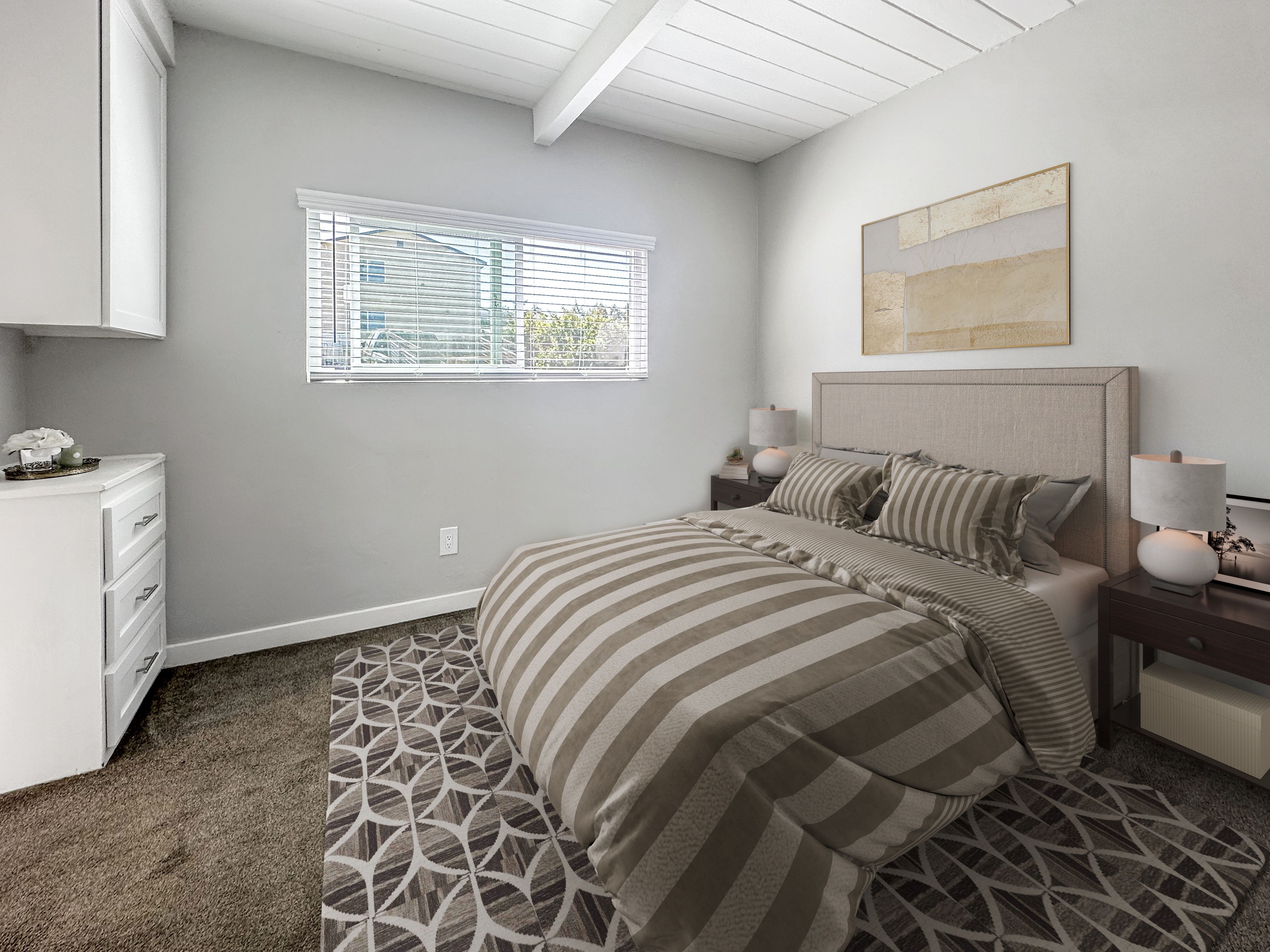 Renovated bedroom with upholstered headboard